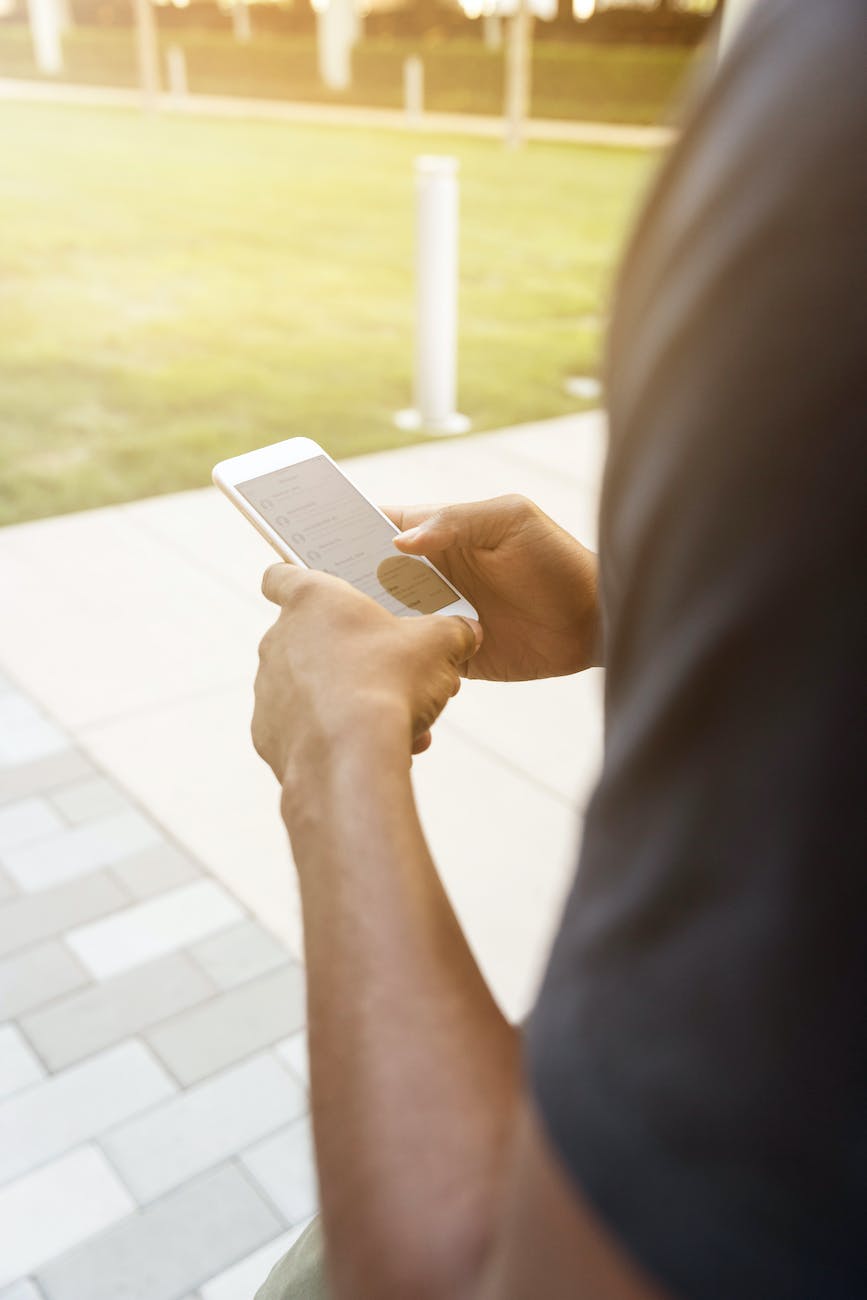 Close-Up photography of Person Using Mobile Phone